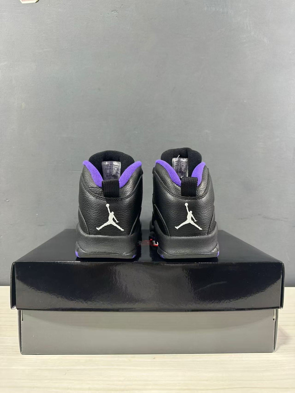 Air Jordan 10 High-Top Sneakers Black Purple 130209-051 - product image from the listing.