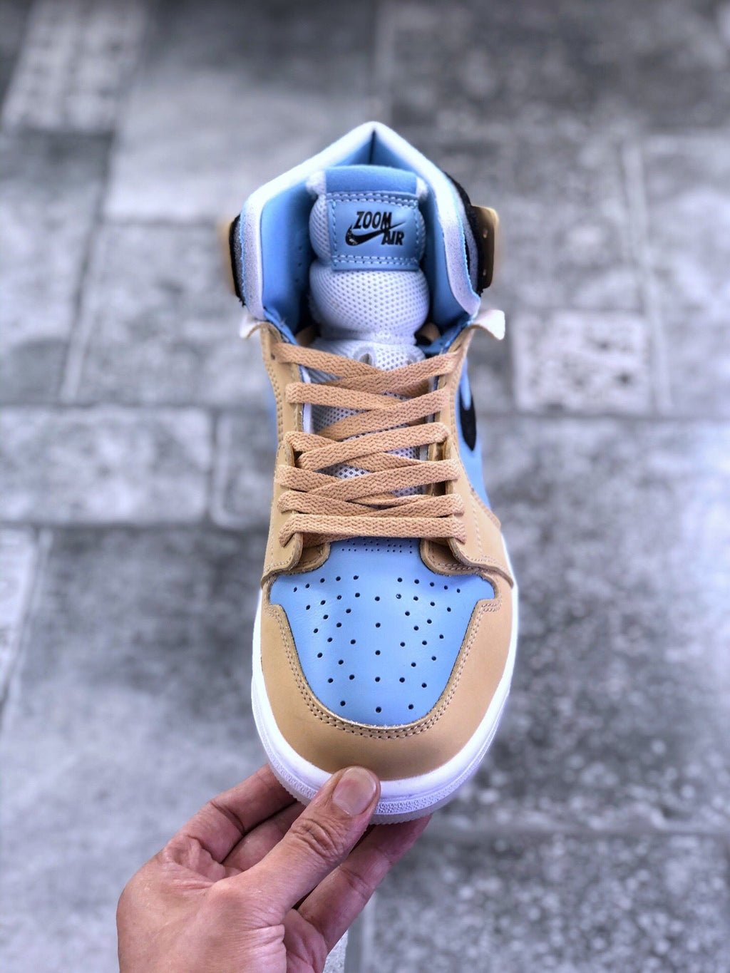 Air Jordan 1 Zoom CMFT Blue Tan Sneakers CT0979-400 - product image from the listing.