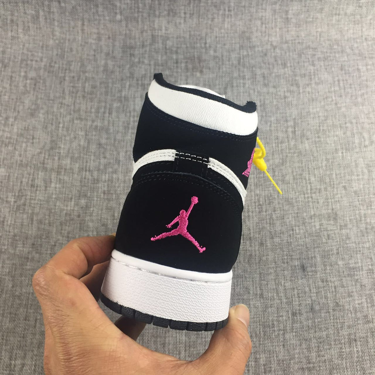 Air Jordan 1 High Black White Pink Sneakers - product image from the listing.