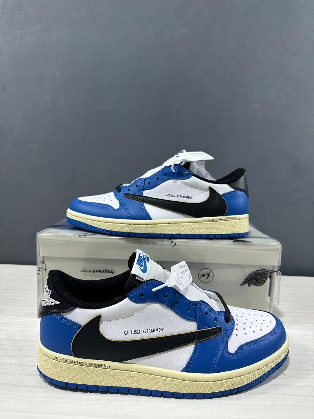 Jordan 1 Low Travis Scott Fragment in Blue White DM7866-141 - product image from the listing.