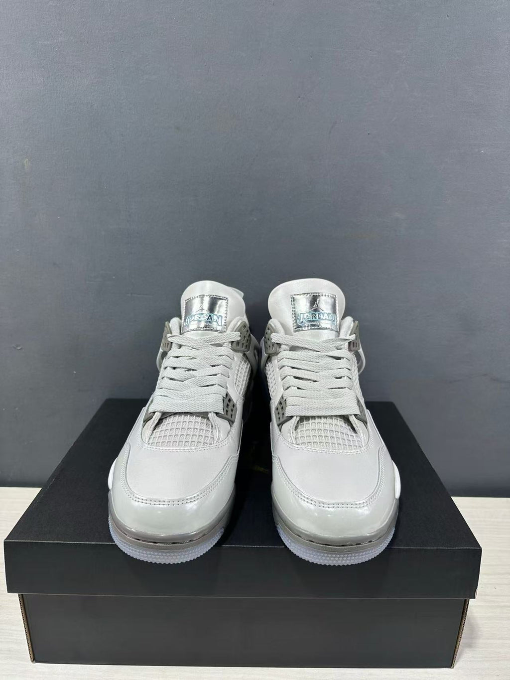 Air Jordan 4 Photon Dust Sneakers HV4401-014 - product image from the listing.