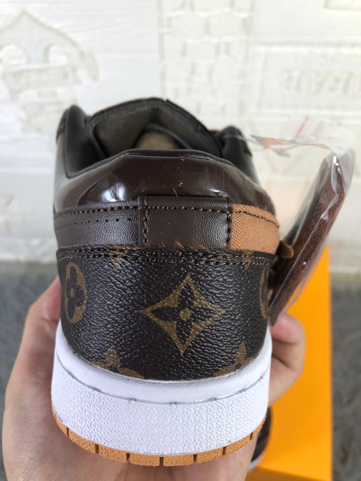Brown Black Sneakers with Monogram Print - Jordan 1 Low - product image from the listing.