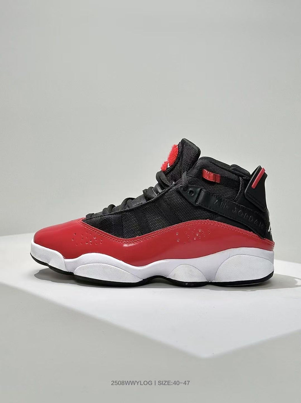 Jordan Six Rings 6-2 Sneakers in Black and Red - product image from the listing.