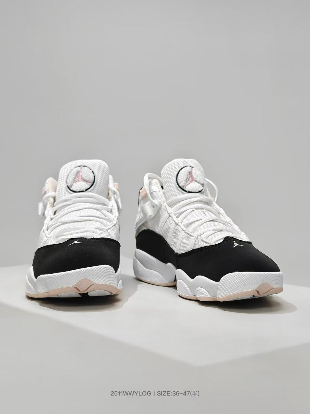 Jordan 8 Sneakers in White Black Pink - product image from the listing.