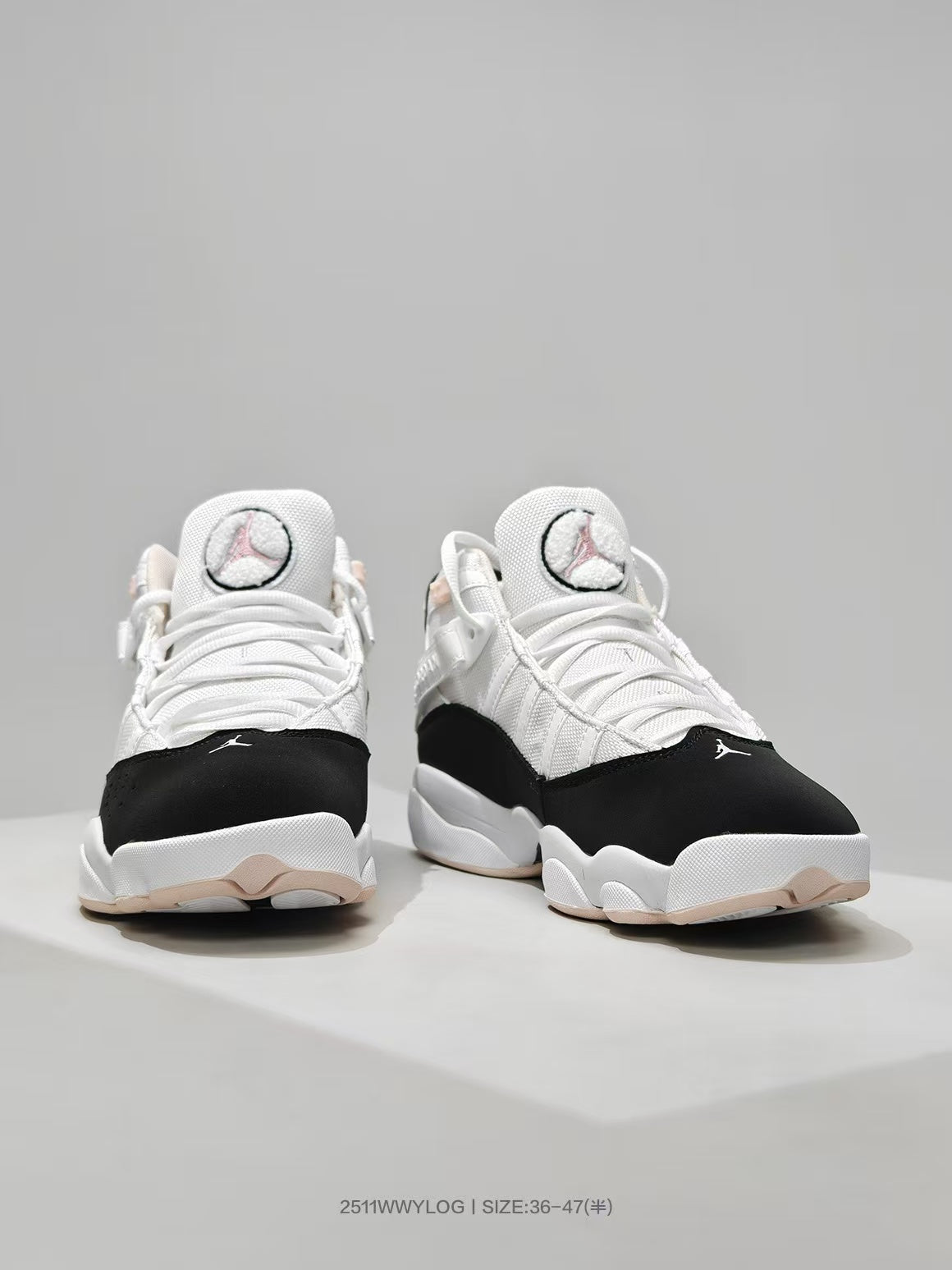 Jordan 8 Sneakers in White Black Pink - product image from the listing.