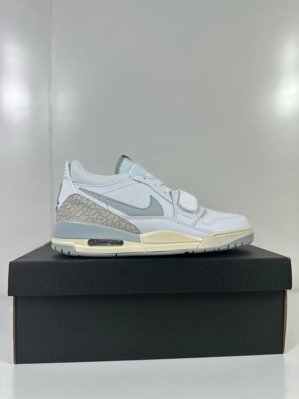 Jordan Legacy 312 Low Sneakers in Silver Yellow HJ3480-101 - product image from the listing.