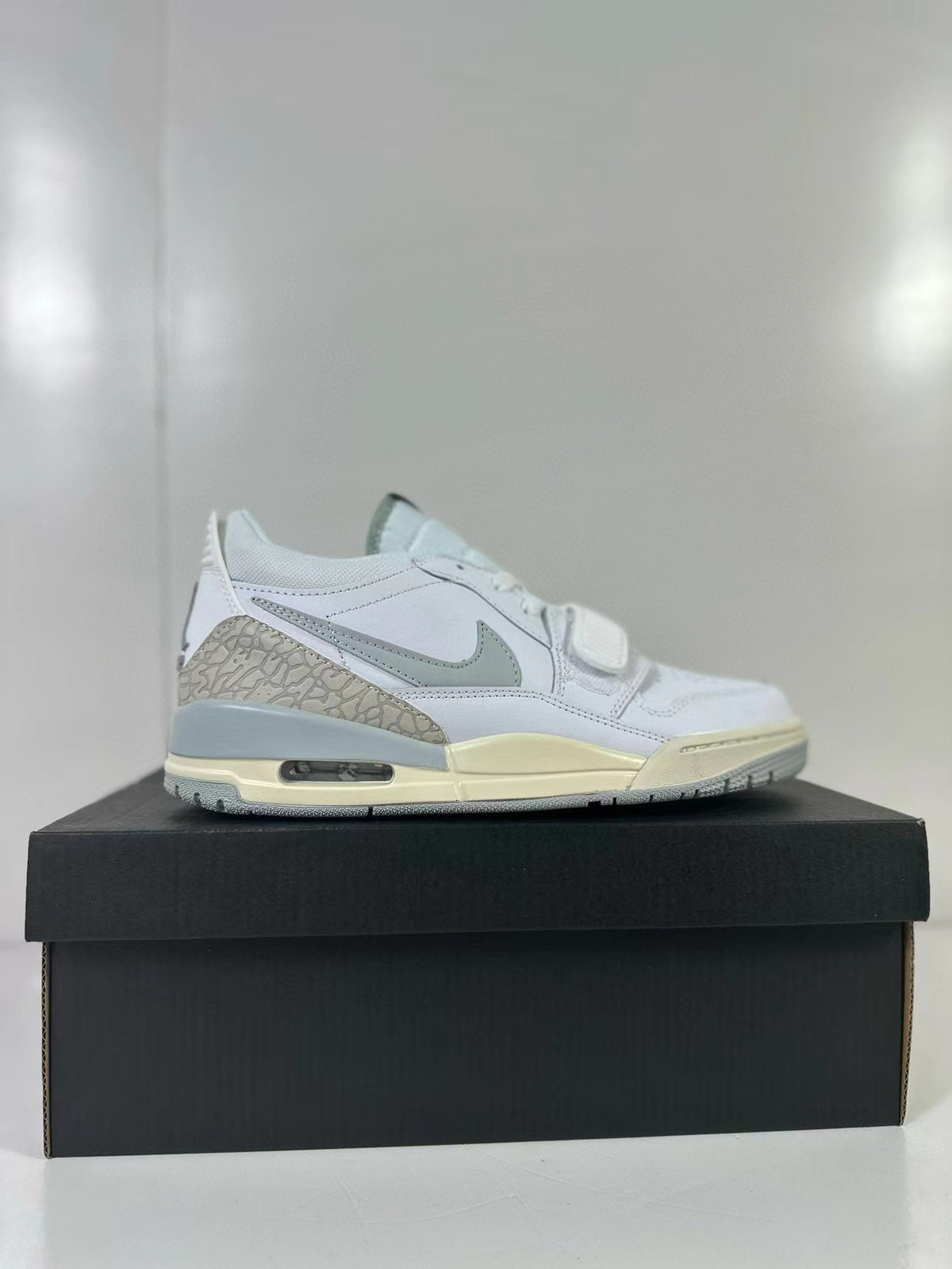 Jordan Legacy 312 Low Sneakers in Silver Yellow HJ3480-101 - product image from the listing.