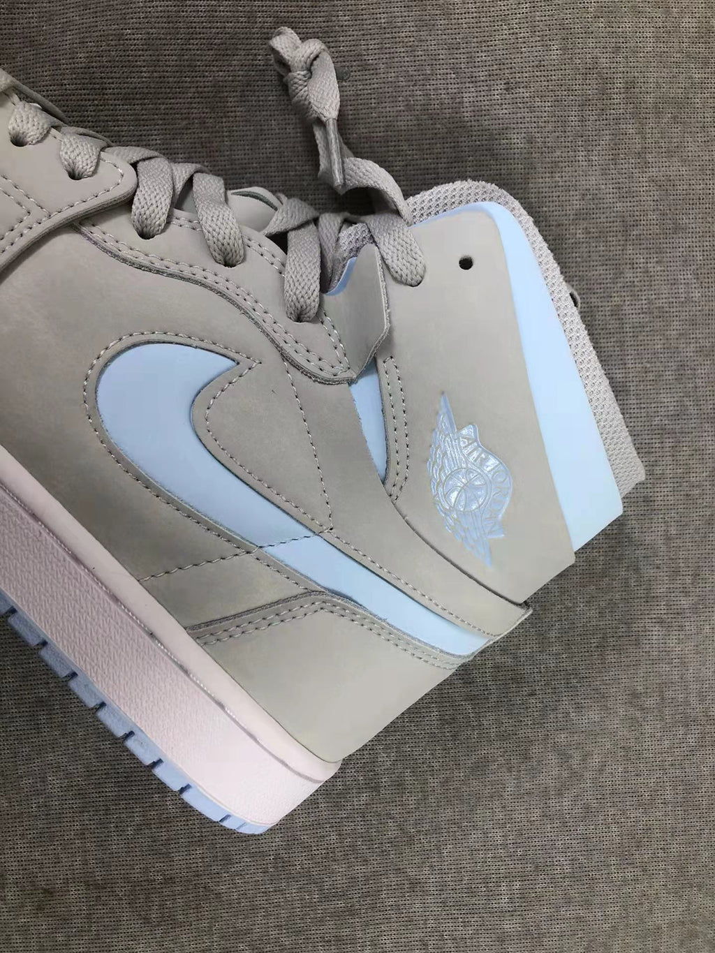 Air Jordan 1 WMNS High Zoom Grey Blue Sneakers - product image from the listing.