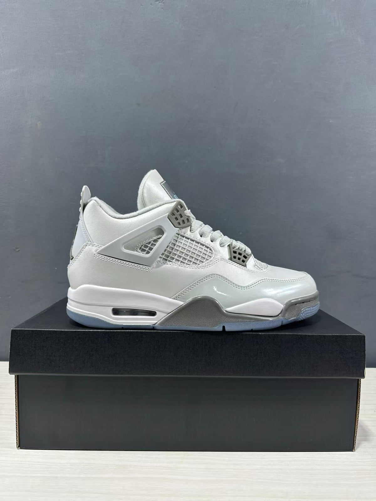 Air Jordan 4 Photon Dust Sneakers HV4401-014 - product image from the listing.