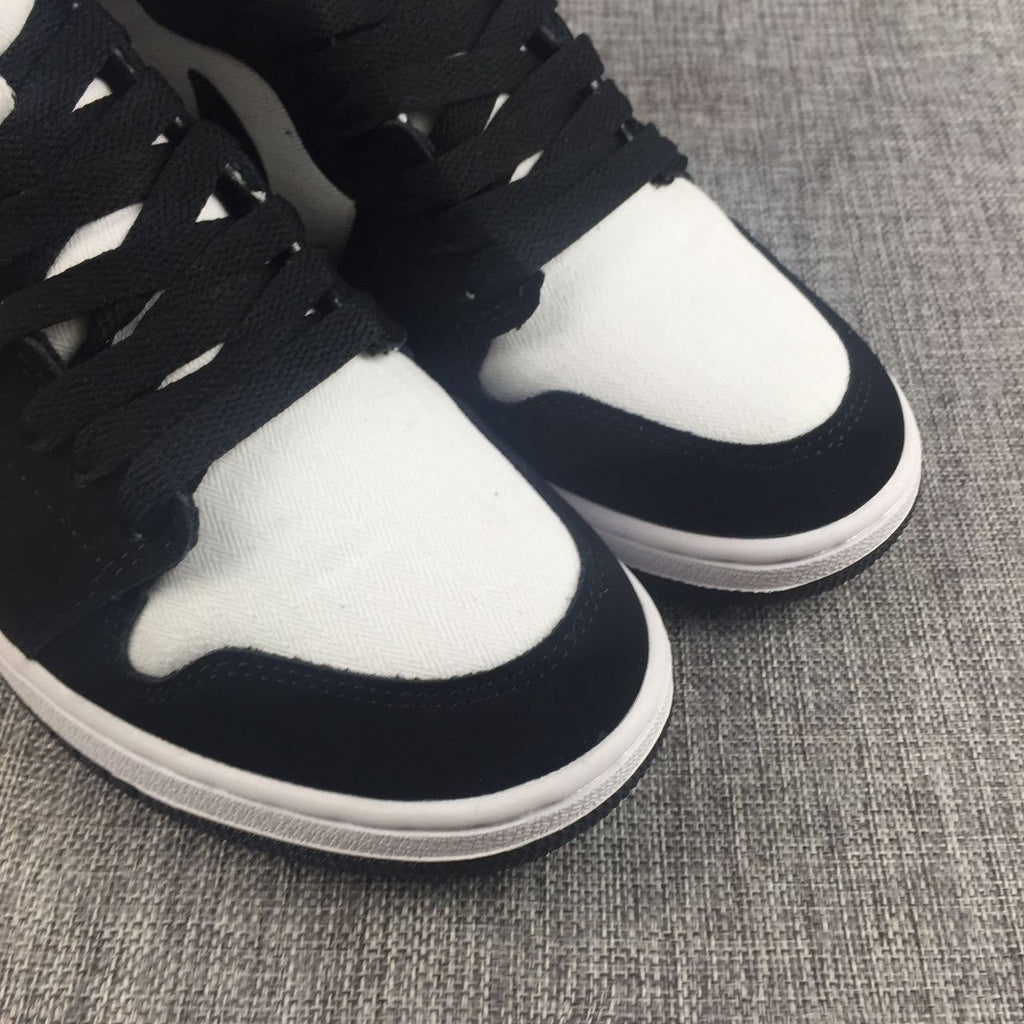 Air Jordan 1 High Black White Pink Sneakers - product image from the listing.