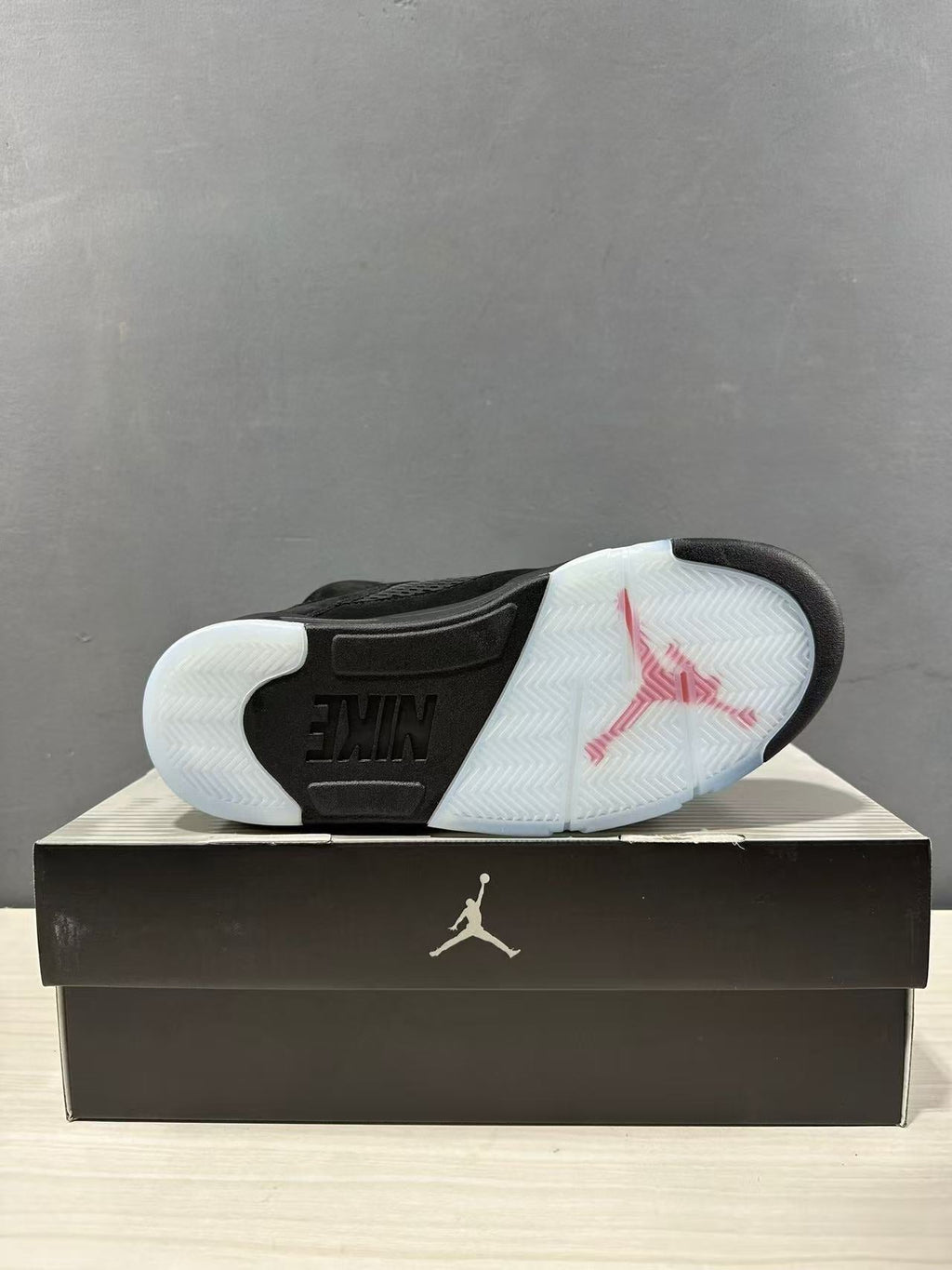 Air Jordan 5 Retro Sneakers Black and Red - product image from the listing.