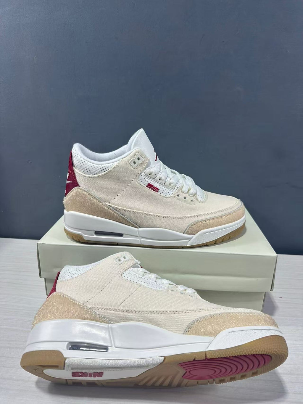 Air Jordan 3 Retro Jumpman Year of the Horse Sneakers Cream Red IR0910-400 - product image from the listing.