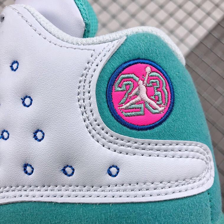 Air Jordan 13 GS Aurora Green Sneakers 439358-100 - product image from the listing.