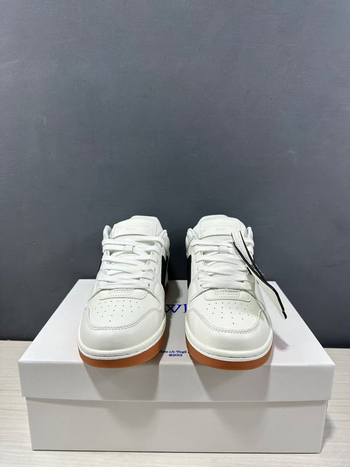 Off-White Out Of Office Sneakers in White Black OMIA189C99LEA0110110 - product image from the listing.