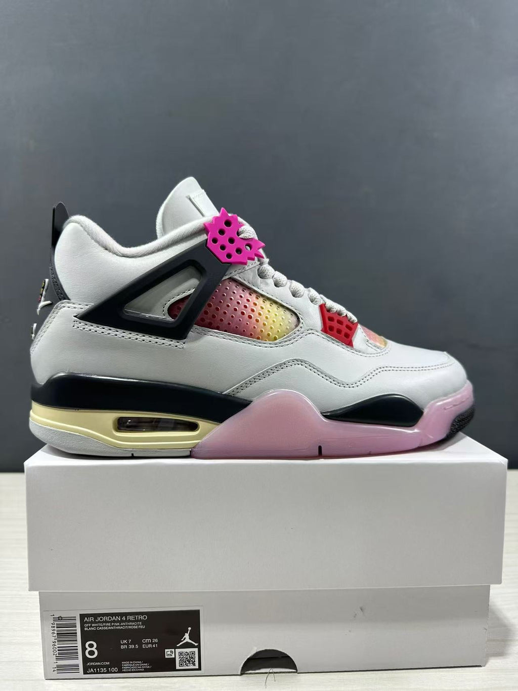 Air Jordan 4 Retro Comic Sneakers White Black Pink JA1135-100 - product image from the listing.