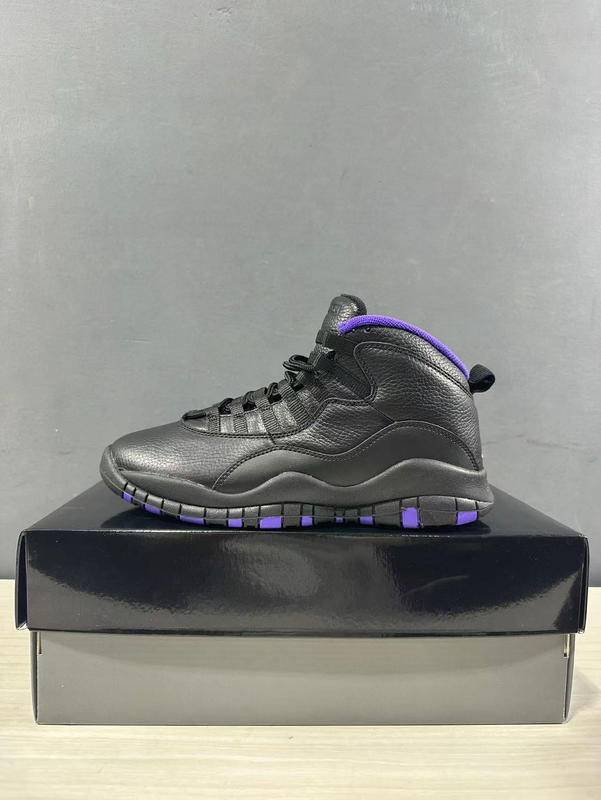 Air Jordan 10 High-Top Sneakers Black Purple 130209-051 - product image from the listing.