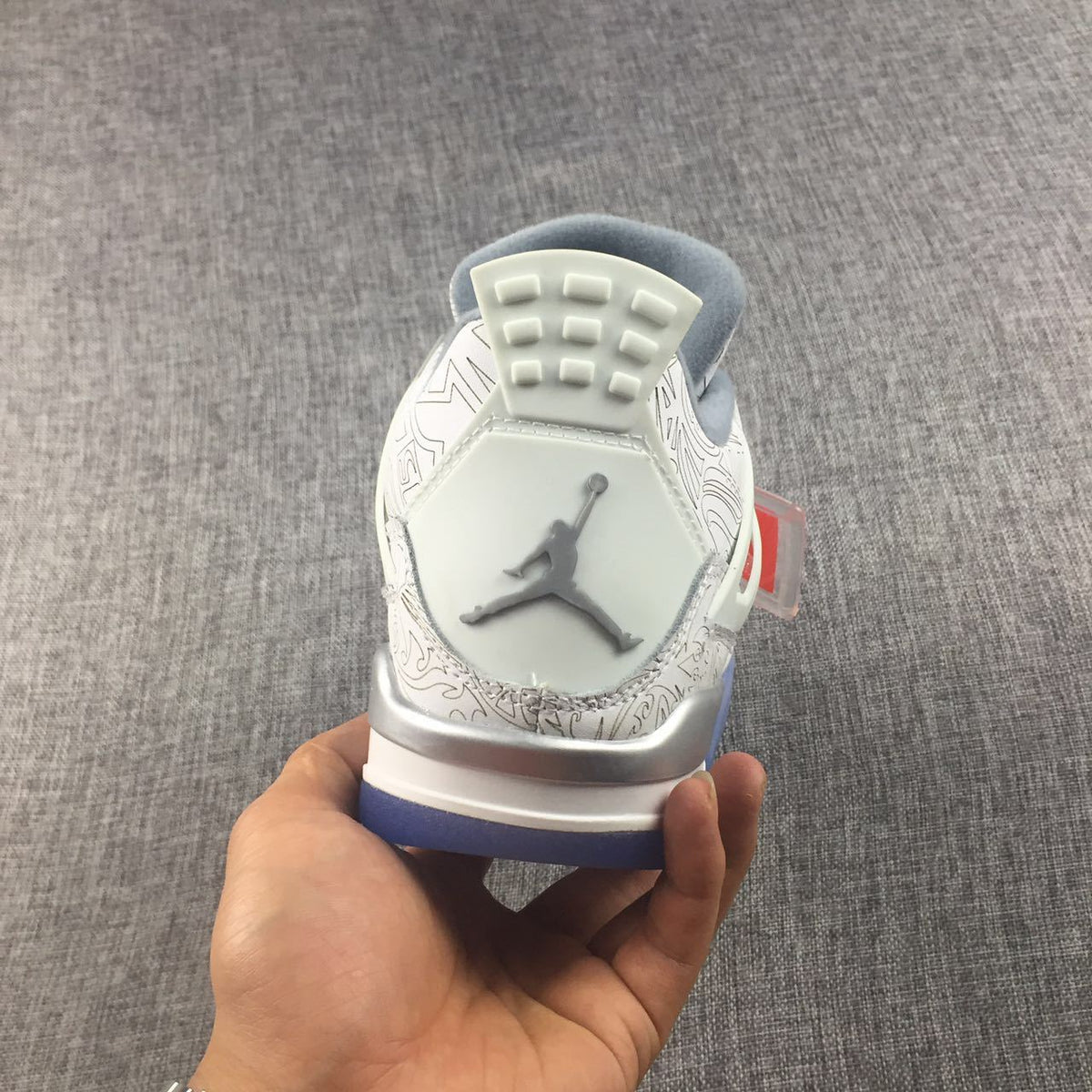 Air Jordan 4 Laser Platinum Sneakers - product image from the listing.