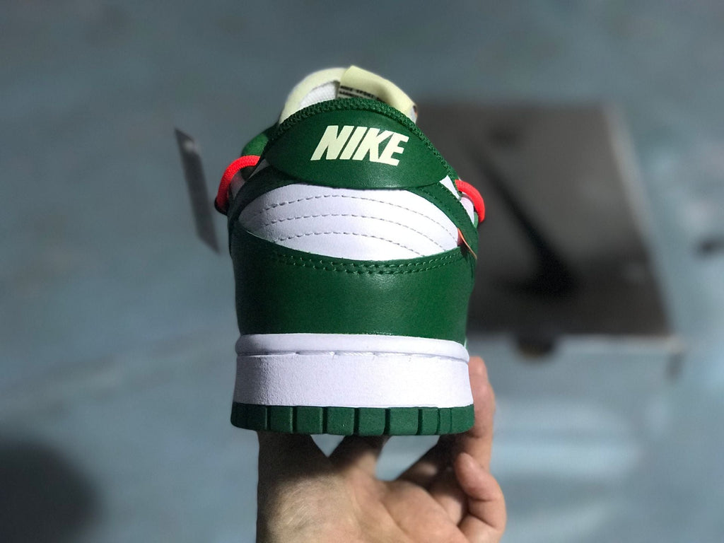 Nike Dunk Low White Pine Sneakers in Green CT0856-100 - product image from the listing.