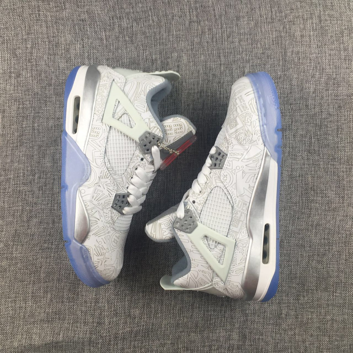 Air Jordan 4 Laser Platinum Sneakers - product image from the listing.