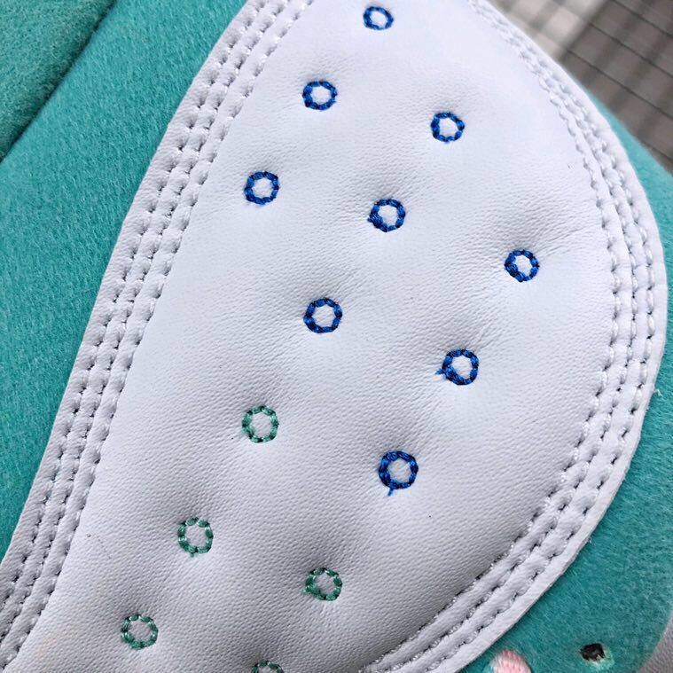 Air Jordan 13 GS Aurora Green Sneakers 439358-100 - product image from the listing.