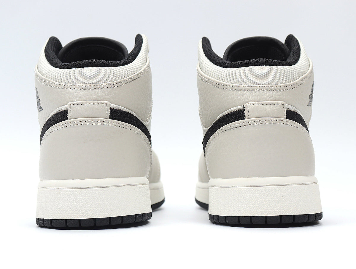 Light Smoke Grey and Black Jordan 1 Retro High OG Sneakers - product image from the listing.