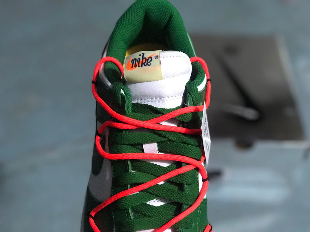 Nike Dunk Low White Pine Sneakers in Green CT0856-100 - product image from the listing.