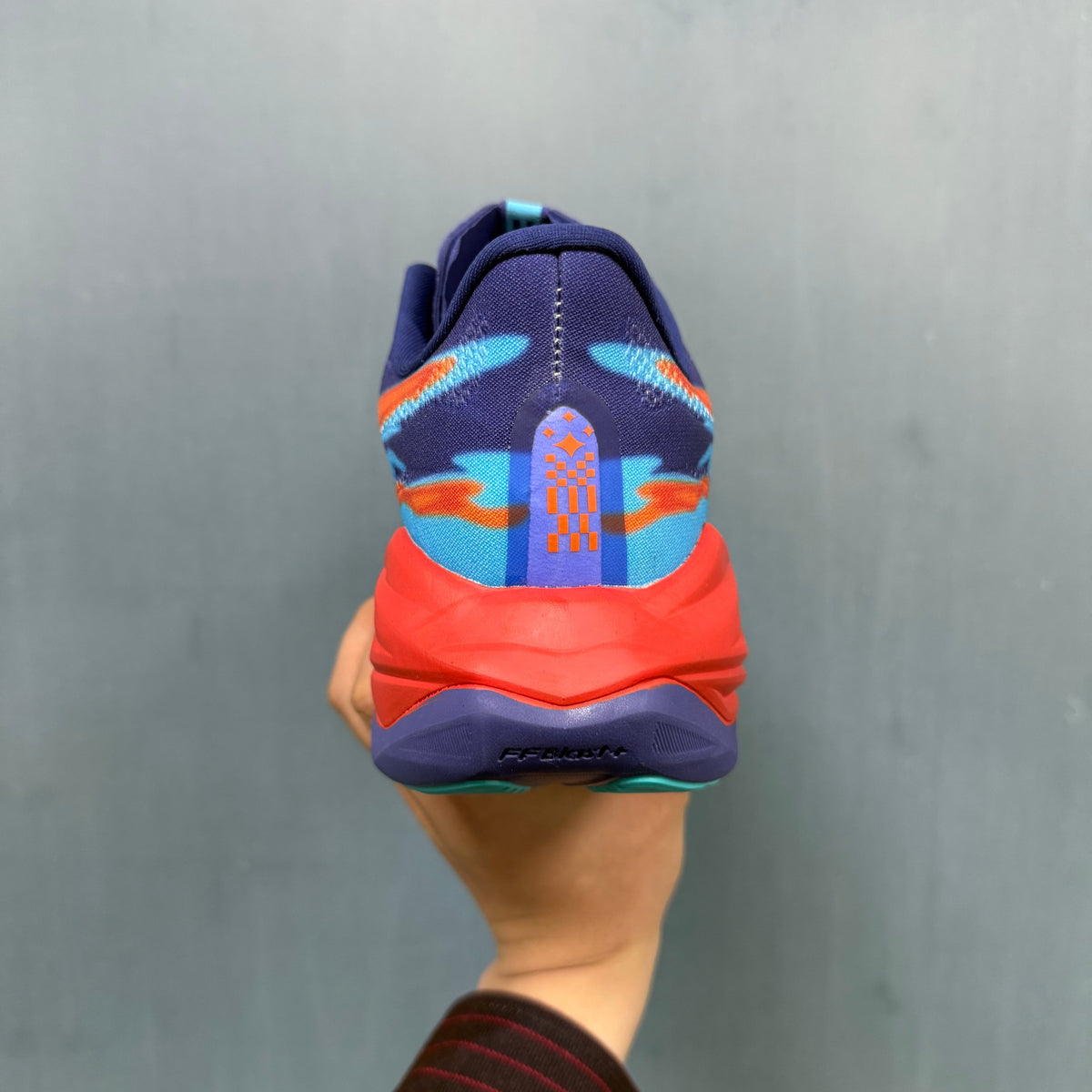 361° P6 Running Shoes in Purple, in Orange and Aqua - product image from the listing.