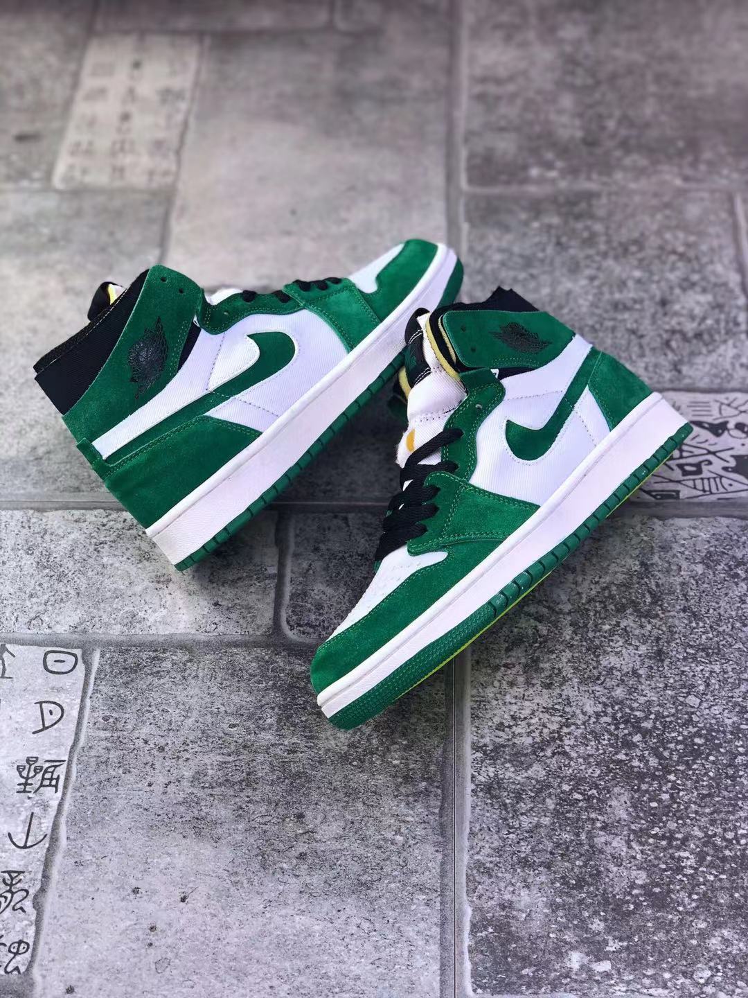 Jordan 1 Zoom CMFT Sneakers in Green White CT0978-300 - product image from the listing.