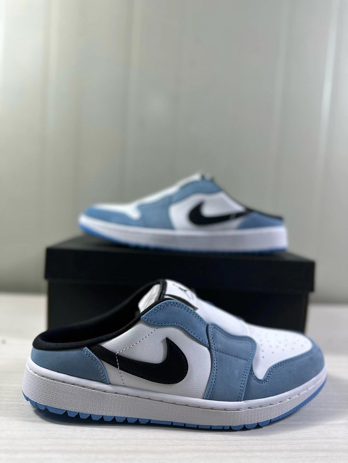 Air Jordan 1 Mule Low Blue White Black FJ1214-400 - product image from the listing.