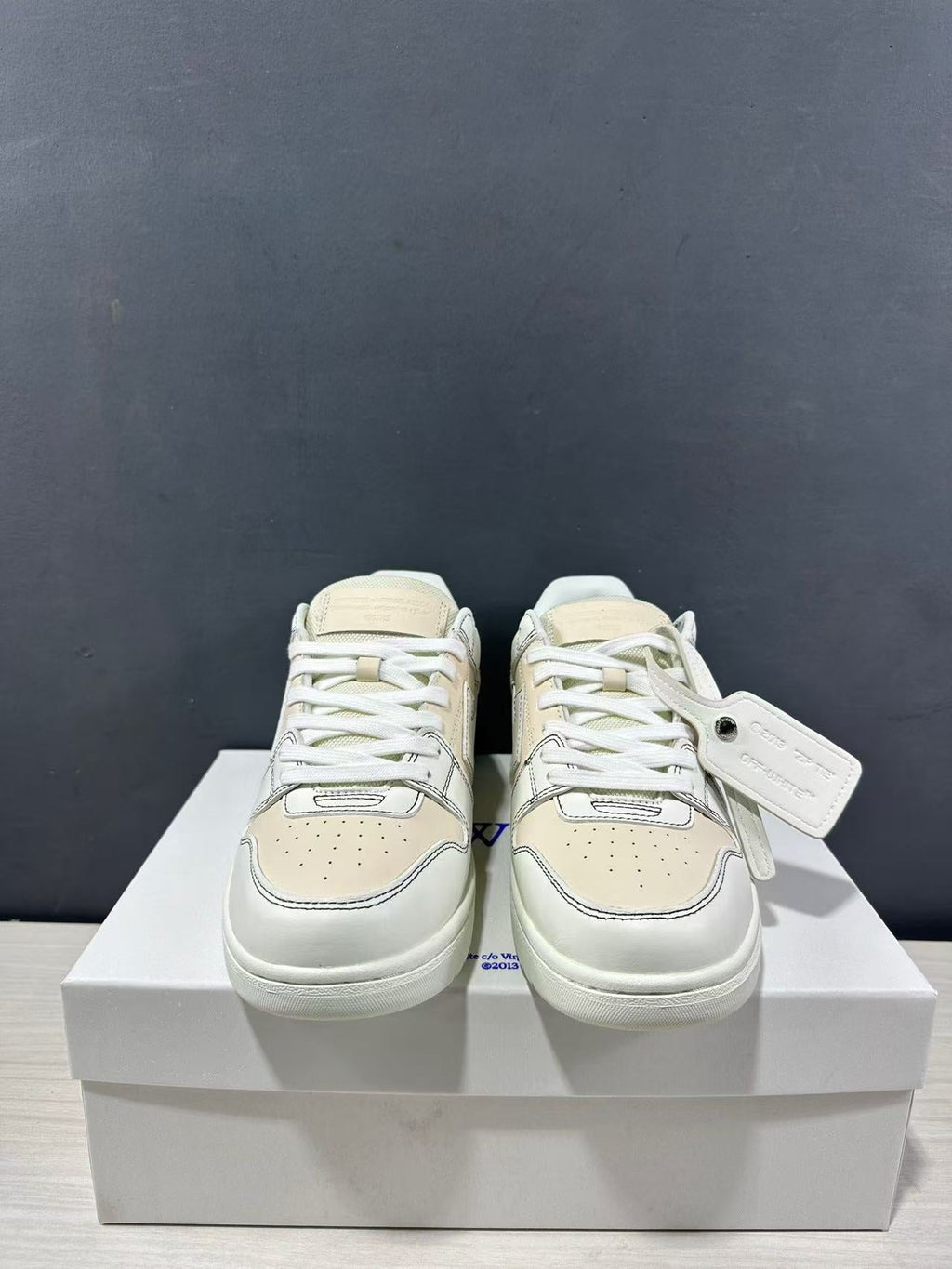 Off-White Off Court Leather Low-Top Sneakers in Cream White - product image from the listing.