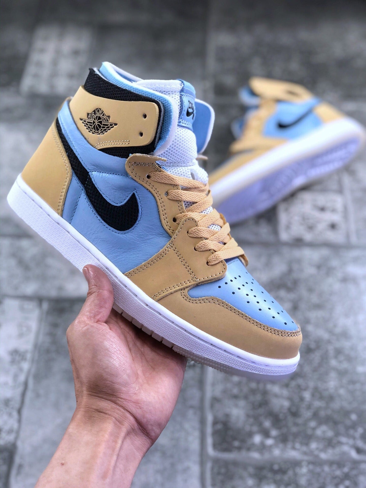 Air Jordan 1 Zoom CMFT Blue Tan Sneakers CT0979-400 - product image from the listing.