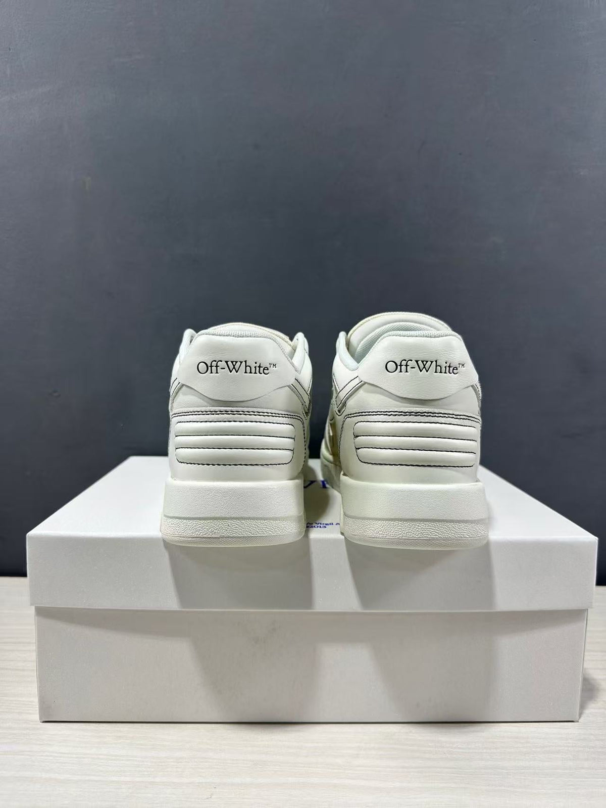 Off-White Off Court Leather Low-Top Sneakers in Cream White - product image from the listing.