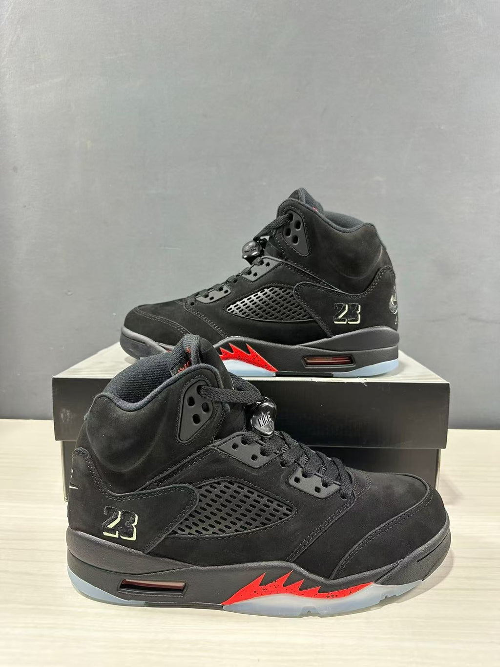 Air Jordan 5 Retro Sneakers Black and Red - product image from the listing.
