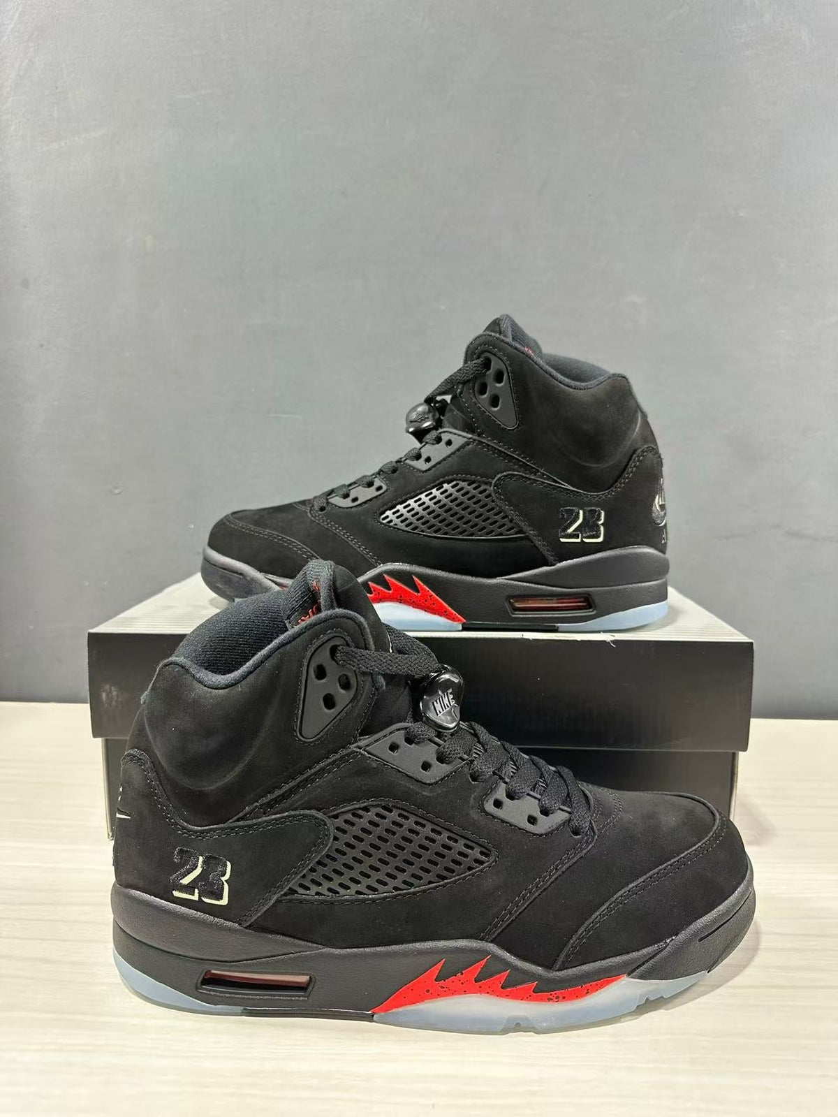 Air Jordan 5 Retro Sneakers Black and Red - product image from the listing.