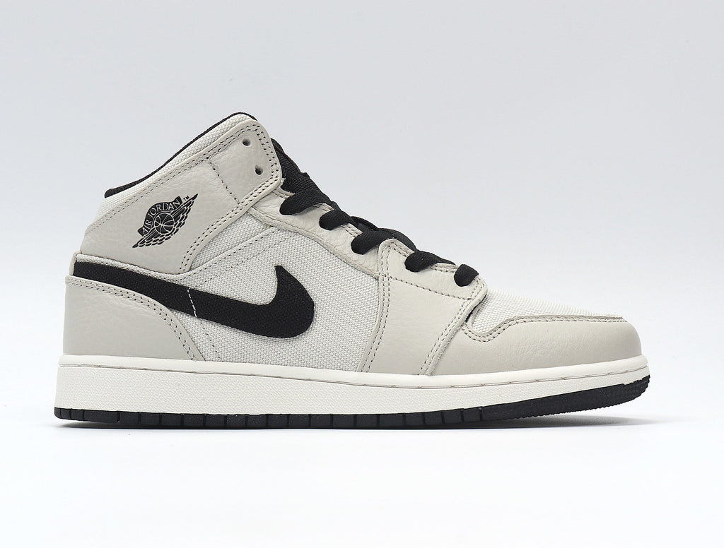 Light Smoke Grey and Black Jordan 1 Retro High OG Sneakers - product image from the listing.