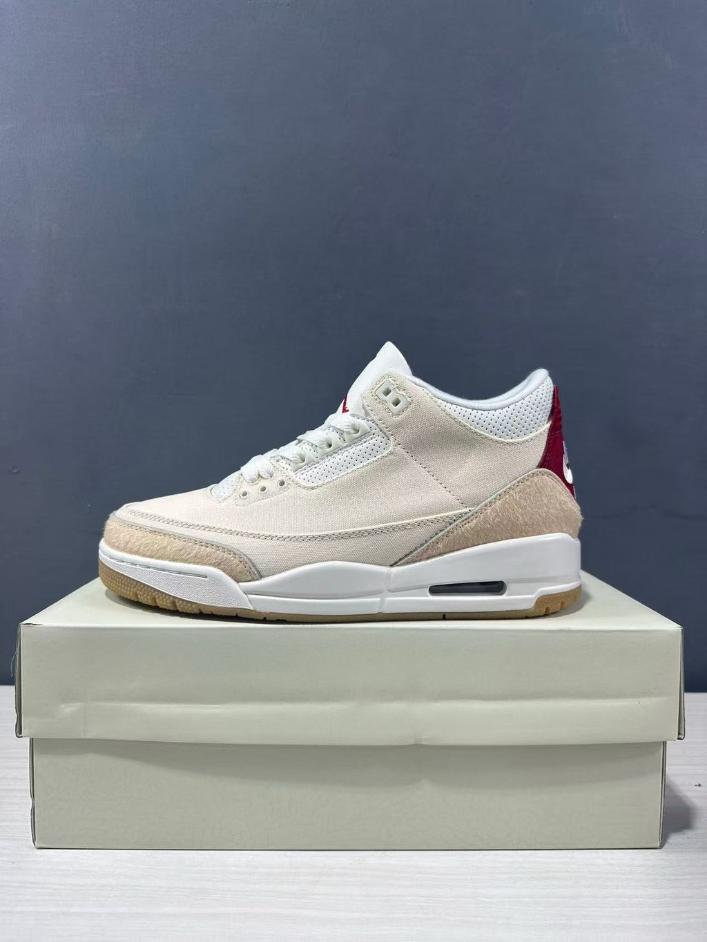 Air Jordan 3 Retro Jumpman Year of the Horse Sneakers Cream Red IR0910-400 - product image from the listing.