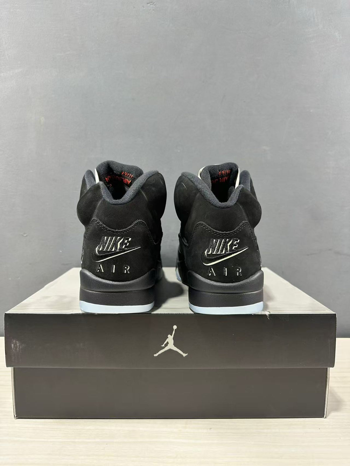 Air Jordan 5 Retro Sneakers Black and Red - product image from the listing.