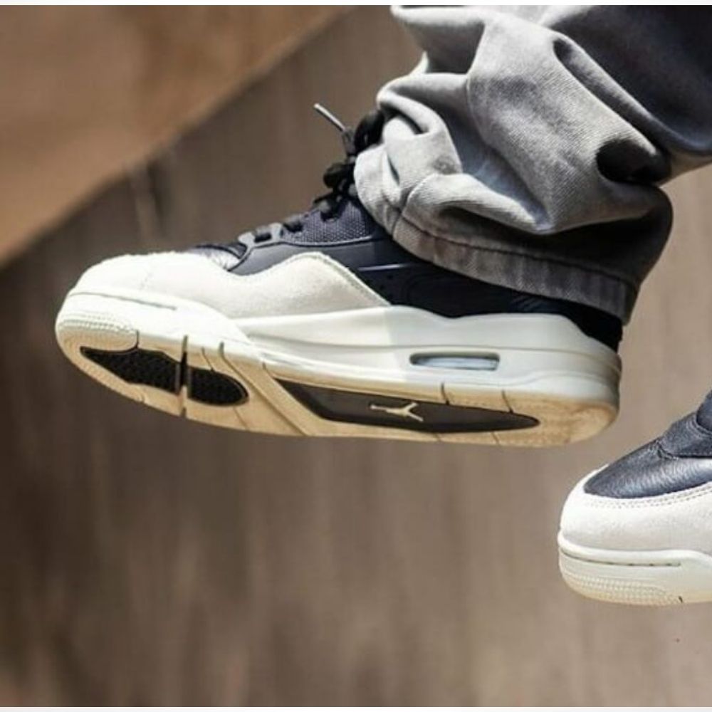 Nigel Sylvester x Air Jordan 4 RM Black Light Bone — product image