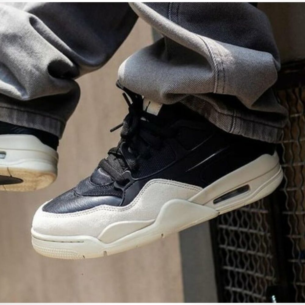 Nigel Sylvester x Air Jordan 4 RM Black Light Bone — product image