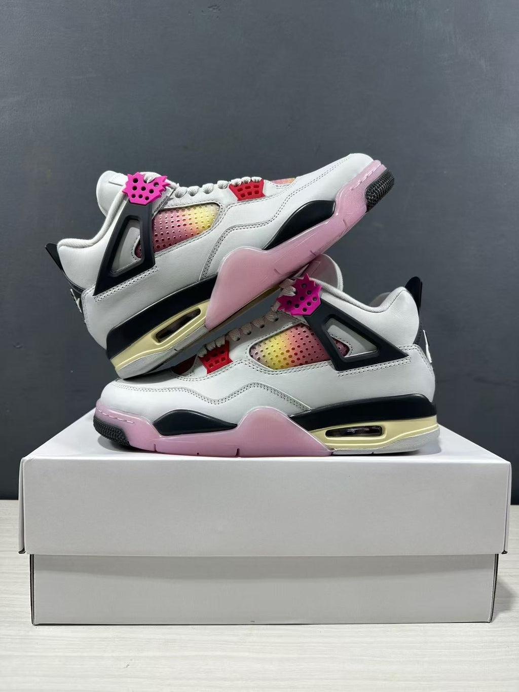 Air Jordan 4 Retro Comic Sneakers White Black Pink JA1135-100 - product image from the listing.