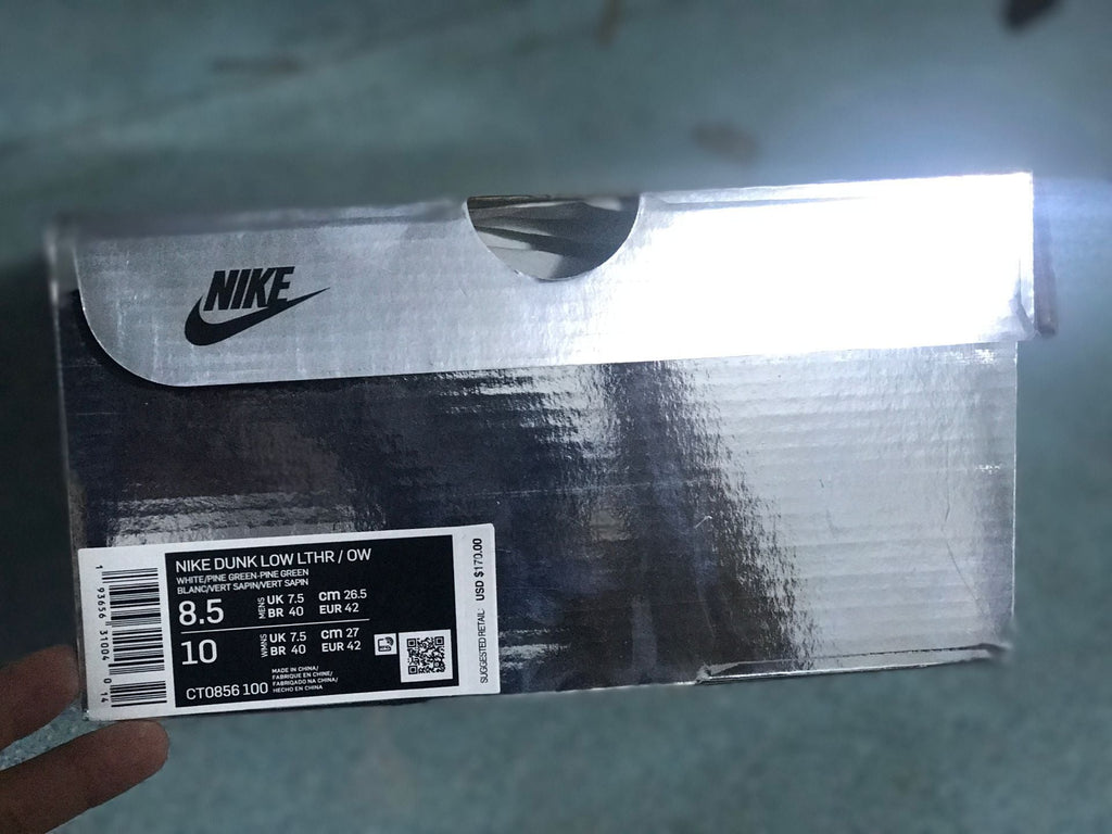 Nike Dunk Low White Pine Sneakers in Green CT0856-100 - product image from the listing.