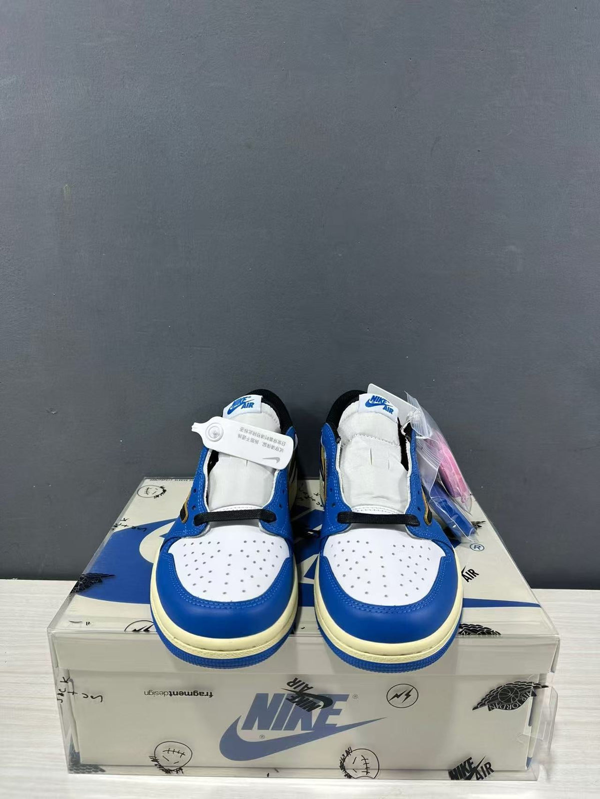 Jordan 1 Low Travis Scott Fragment in Blue White DM7866-141 - product image from the listing.