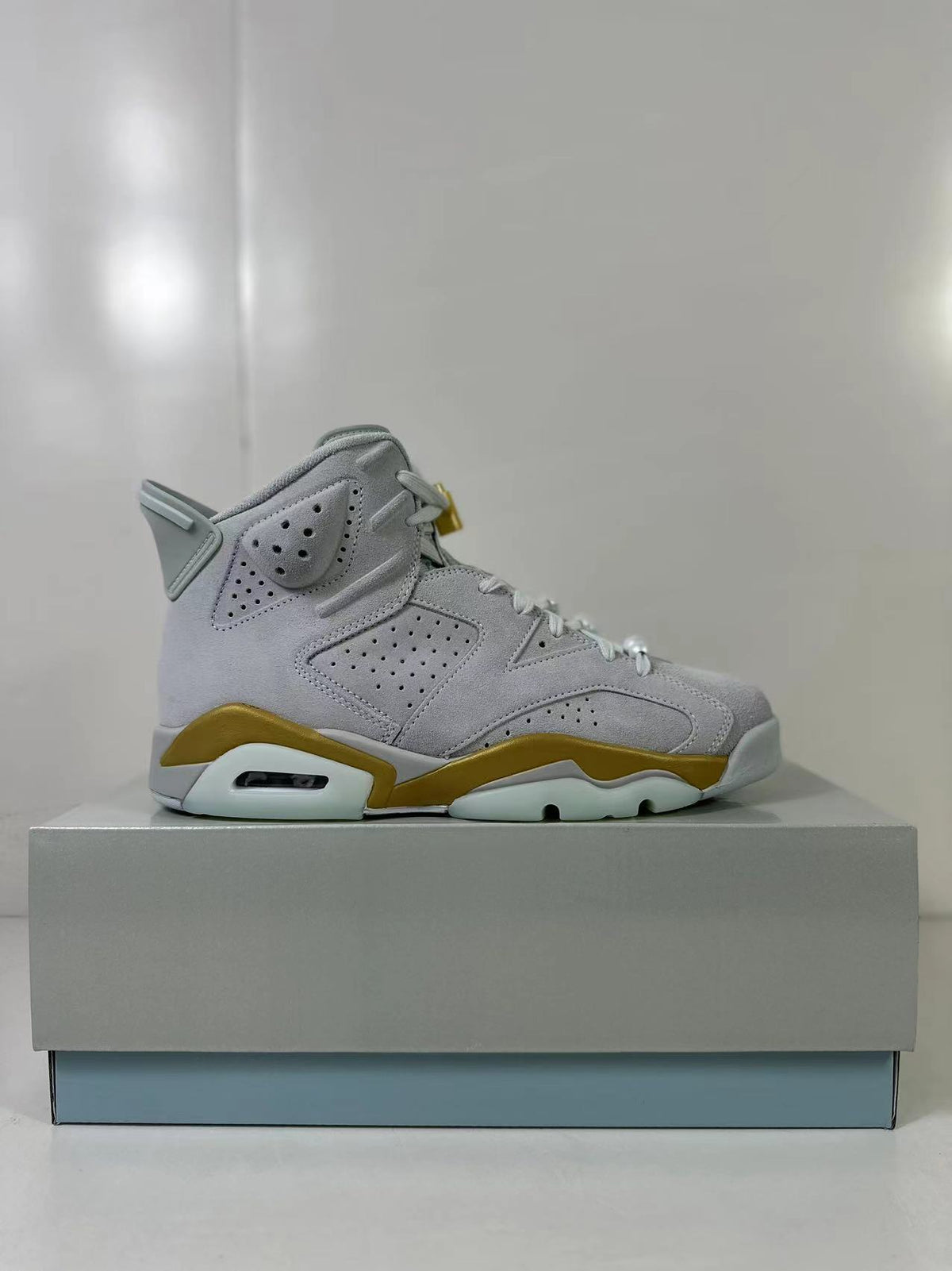 Air Jordan 6 High Sneakers White Gold Glacier Blue DQ4914-074 - product image from the listing.
