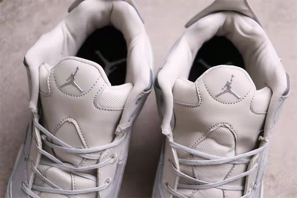 Jordan 23 Low Sneakers in White Gray AR1002-003 - product image from the listing.