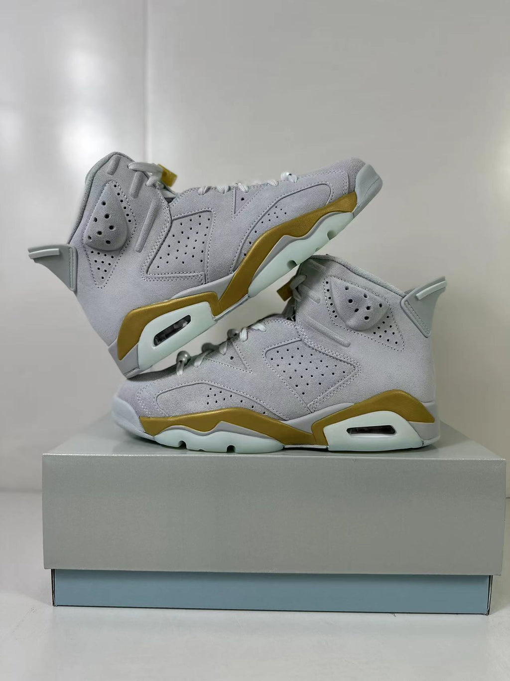 Air Jordan 6 High Sneakers White Gold Glacier Blue DQ4914-074 - product image from the listing.