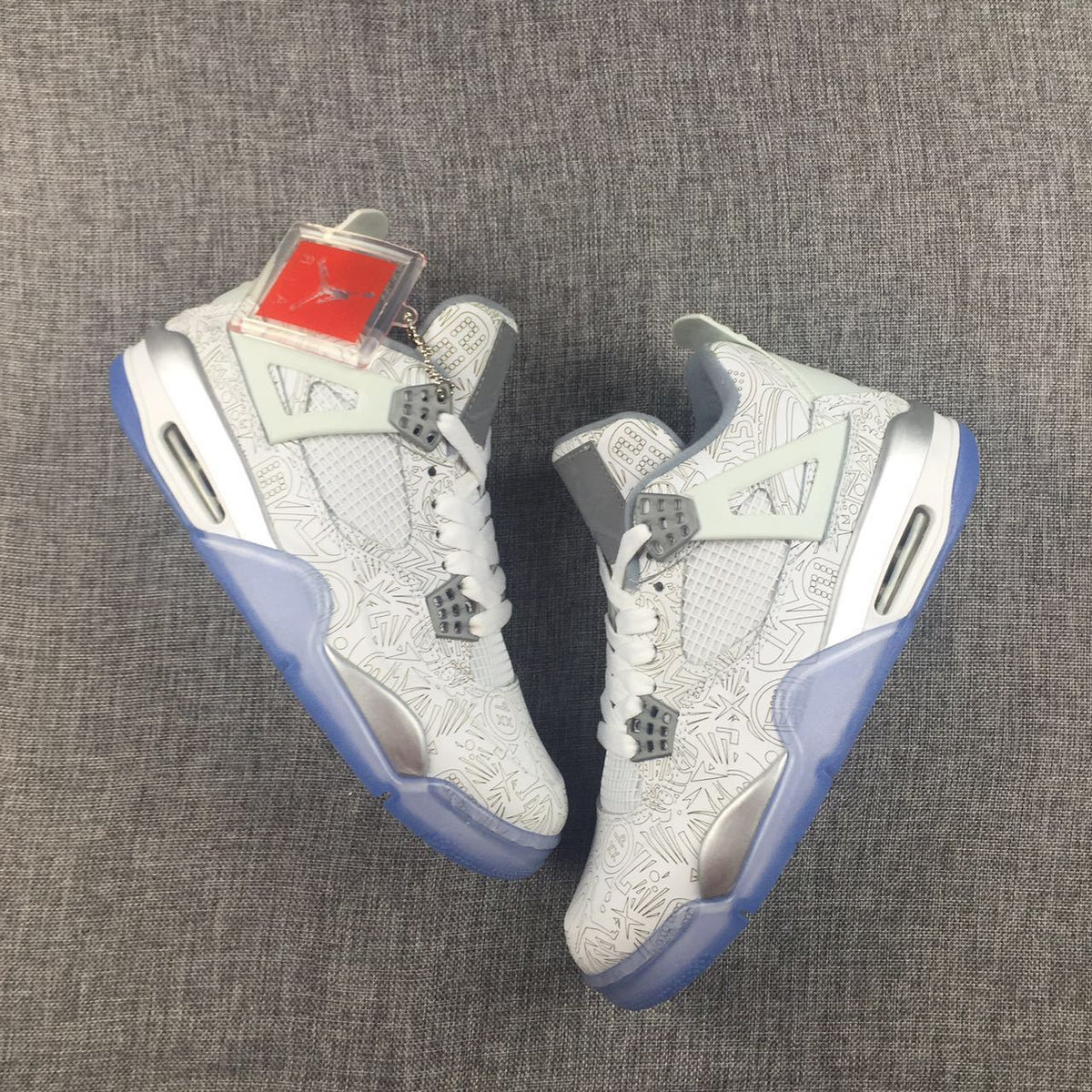 Air Jordan 4 Laser Platinum Sneakers - product image from the listing.