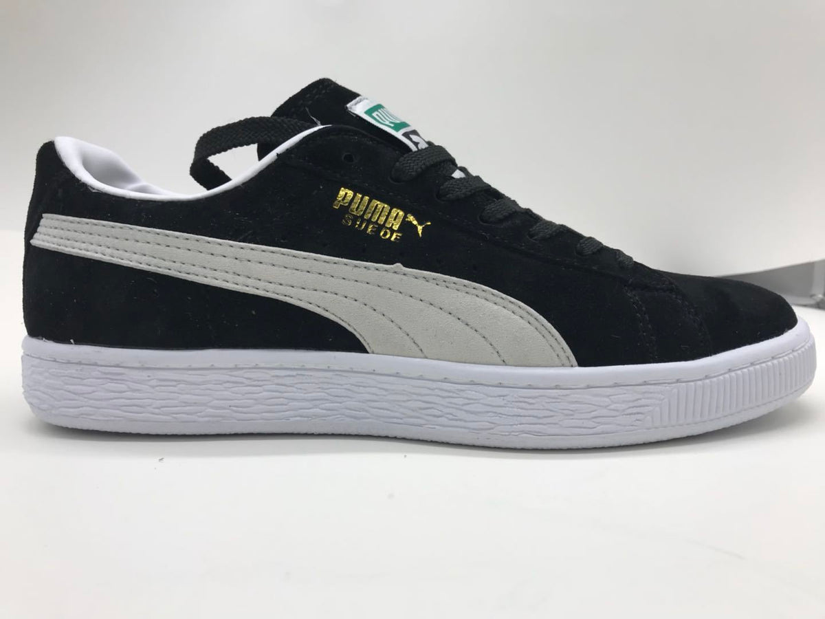 Puma Low-Top Sneakers in Suede Black and White - product image from the listing.