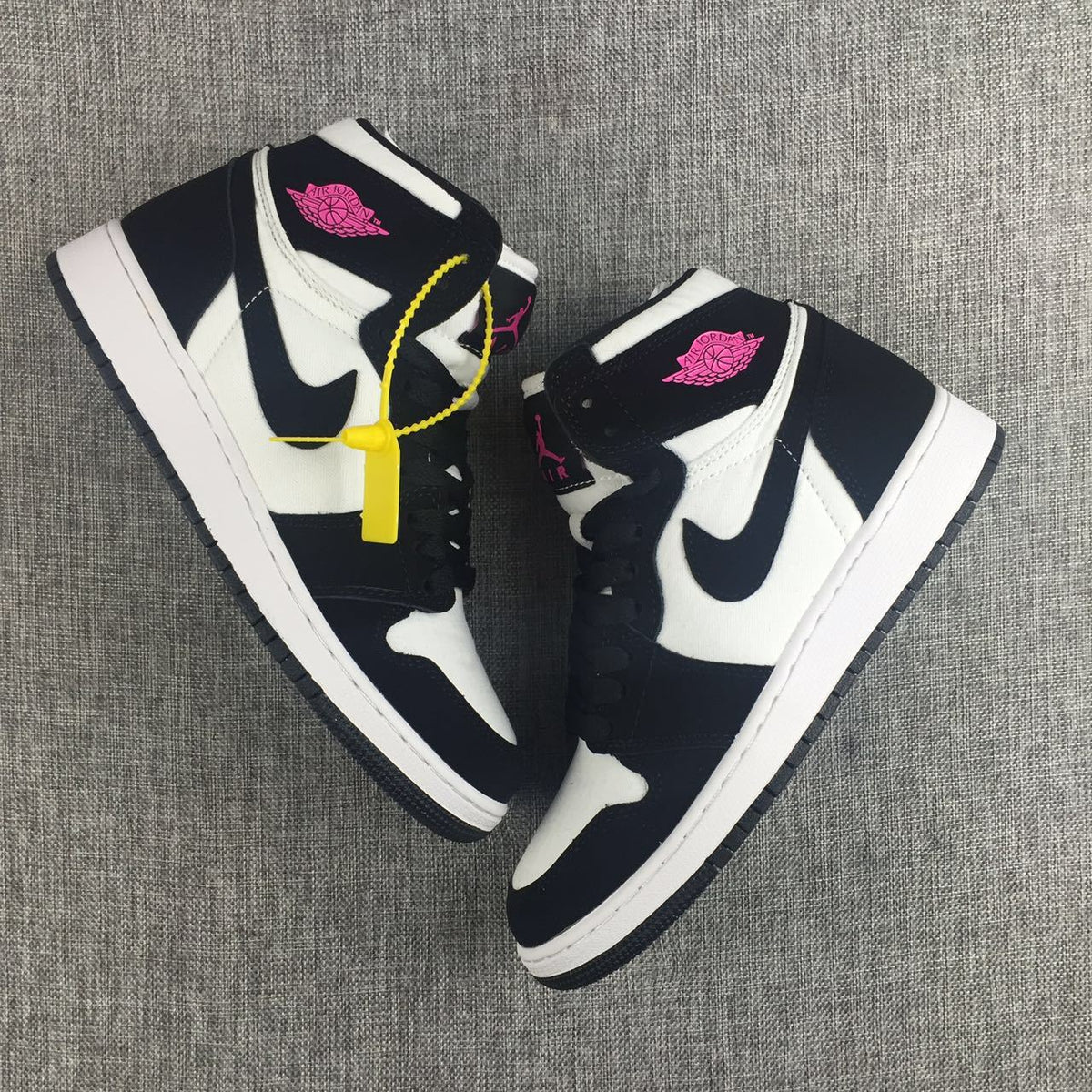 Air Jordan 1 High Black White Pink Sneakers - product image from the listing.