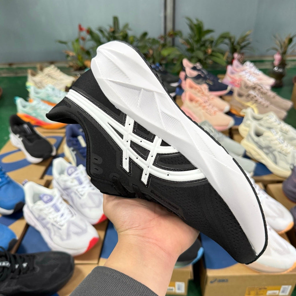 ASICS NOVABLAST 5 LE Running Shoes in Black and White - product image from the listing.