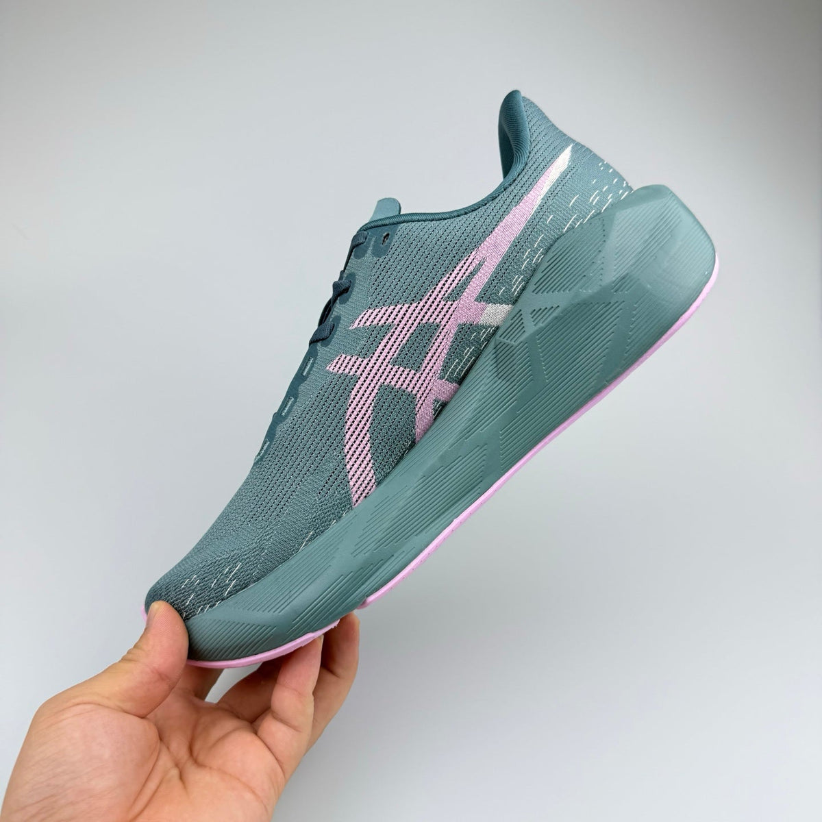 ASICS Gel-Nimbus 27 Running Shoes in Blue Pink 1012C765-001 - product image from the listing.